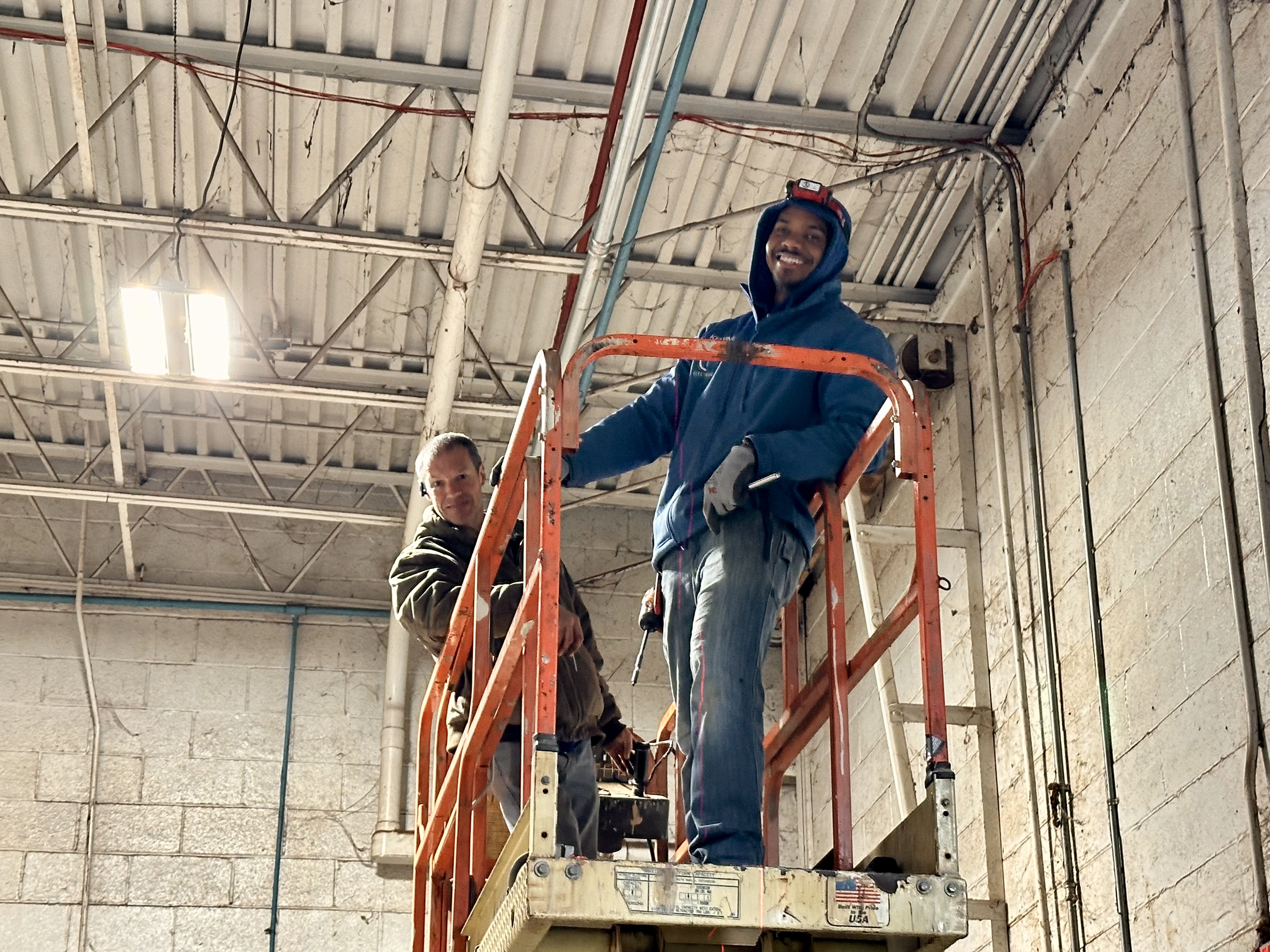 Brian & Kelvin running new 100A feeder for a commercial project